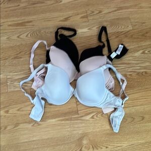 Set of nursing bras size 34D- Black, Cream, and White